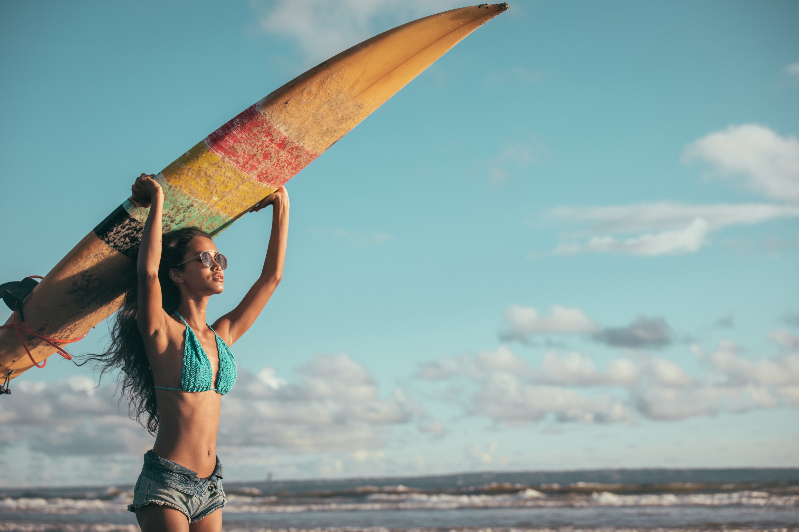 Girl going surfing